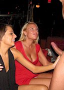 Wild and busty women party at a strip club