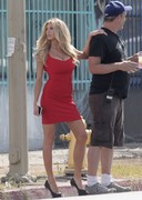 Charlotte McKinney in a red dress