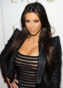 Kim Kardashian curvy in a dress