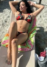 Anissa Kate bathes under the sun and reveals her huge boobs