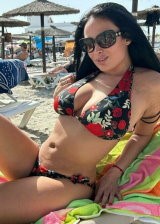 Anissa Kate bathes under the sun and reveals her huge boobs