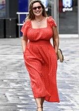 Kelly Brook looking gorgeous with her huge boobs in a red dress