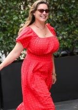 Kelly Brook looking gorgeous with her huge boobs in a red dress