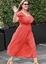 Kelly Brook looking gorgeous with her huge boobs in a red dress