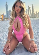 Teigan Lucas does a hot beach photoshoot with her juicy melons