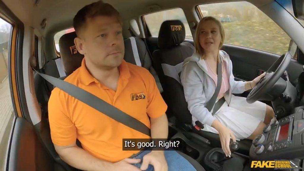 Sexy blonde taking her driving test