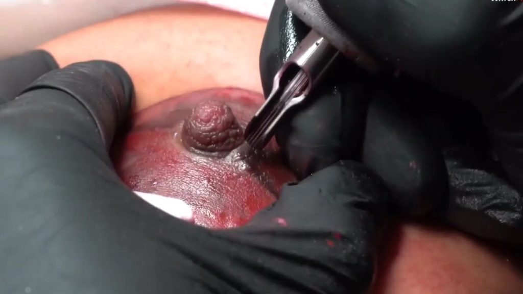 nipple being tattooed